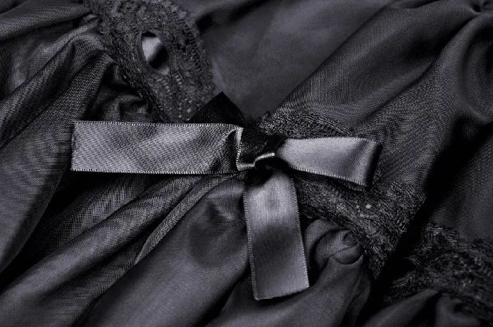 Sophisticated Black Skirt Adorned with Bow Accents EVEs SECRETS Anal
